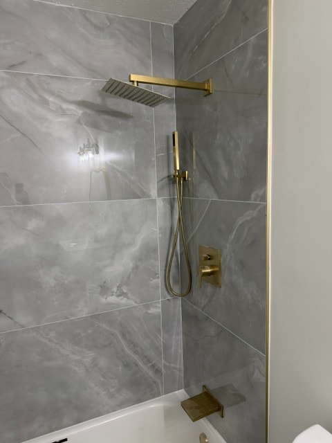 Custom Shower with Gold Fixtures